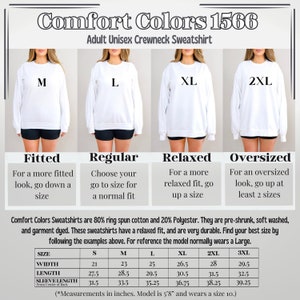 May include: A size chart for a unisex crewneck sweatshirt made by Comfort Colors. The chart shows the measurements in inches for different sizes, including width, length, and sleeve length. The model is 5'8" and wears a size 10.