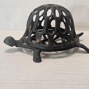 Soporte para cuerda de tortuga, hierro fundido