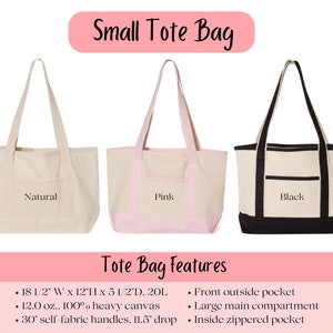 May include: Three tote bags in natural, pink, and black canvas. Each bag has a front pocket and a zippered pocket. The bags are 18 1/2 inches wide, 12 inches high, and 5 1/2 inches deep. They are made of 12 ounce, 100% heavy canvas and have 30 inch self-fabric handles with a 11.5 inch drop.