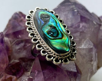 Abalone jewelry set featuring ring earrings, and bracelet .