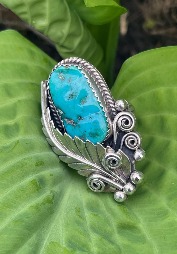 Stunning turquoise and sterling silver Navajo sign