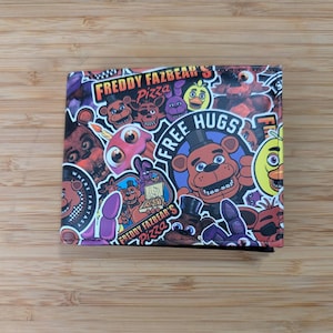 Cartera plegable con temática de la serie de juegos Five Nights at Freddy's