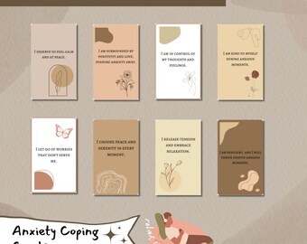 May include: Set of 30 affirmation cards with brown, beige, and cream backgrounds. Each card features a different affirmation related to anxiety coping, such as "I deserve to feel calm and at peace." and "I am kind to myself during anxious moments."