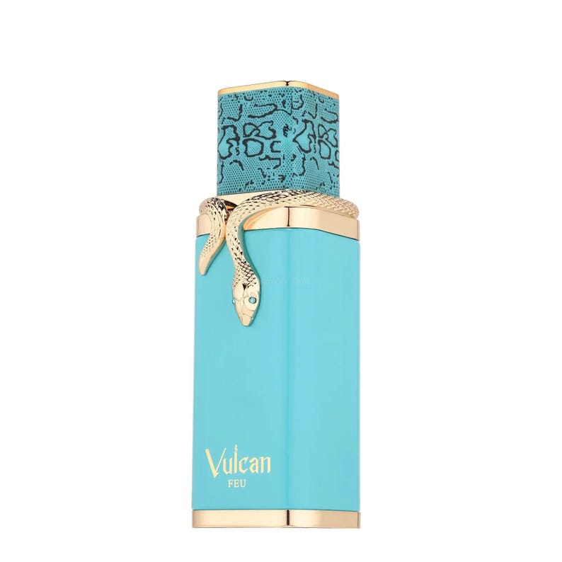 May include: A turquoise perfume bottle with gold accents and a snake design. The bottle has a rectangular shape with a patterned top and the word "Vulcan" printed on the front.