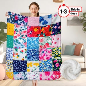 May include: A patchwork quilt throw blanket with a variety of floral and geometric patterns in bright colors, including pink, red, blue, green, and yellow. The blanket is made of soft, comfortable fabric and is perfect for adding a touch of color and style to any room.