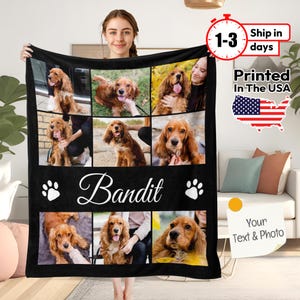 May include: A black fleece blanket featuring a collage of six photographs of a brown and white dog. The blanket has the name "Bandit" printed in white cursive font and two white paw prints on either side of the name.