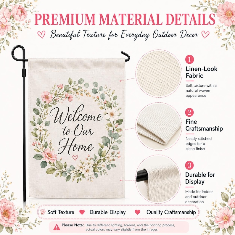 May include: A rectangular garden flag featuring the text Welcome to Our Home in black script, surrounded by a floral wreath of pink flowers and green leaves. The flag is displayed on a black metal stand and includes close-up fabric details.