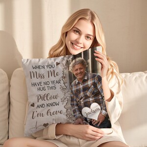 May include: A personalized pillow with a photo of a person and the text "WHEN YOU Miss Me HAVE NO FEAR HUG THIS Pillow AND KNOW I'm here." The pillow has a heart-shaped design with the name "Jackson" on it.
