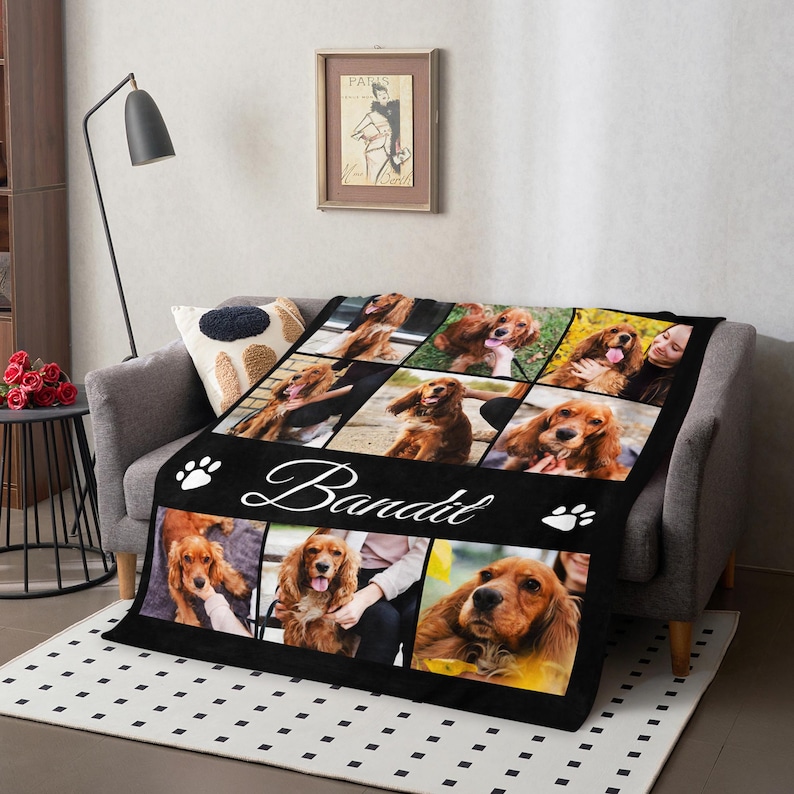 May include: Black fleece blanket featuring a collage of photos of a golden brown dog named Bandit. The blanket has a white paw print and the name Bandit in white cursive.