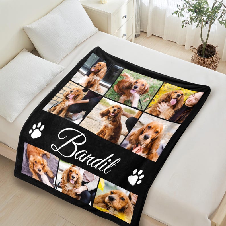 May include: Black fleece blanket featuring a collage of photos of a brown and white dog. The blanket has a white paw print design and the word "Bandit" written in white cursive.