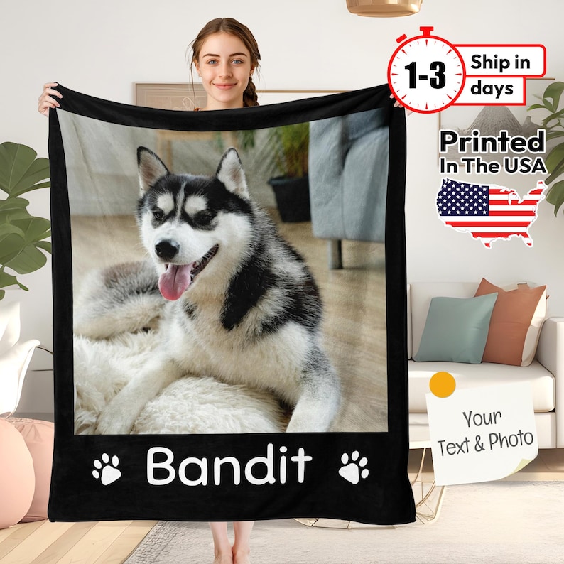 May include: Black and white fleece blanket featuring a photo of a husky dog with the name "Bandit" printed on it.