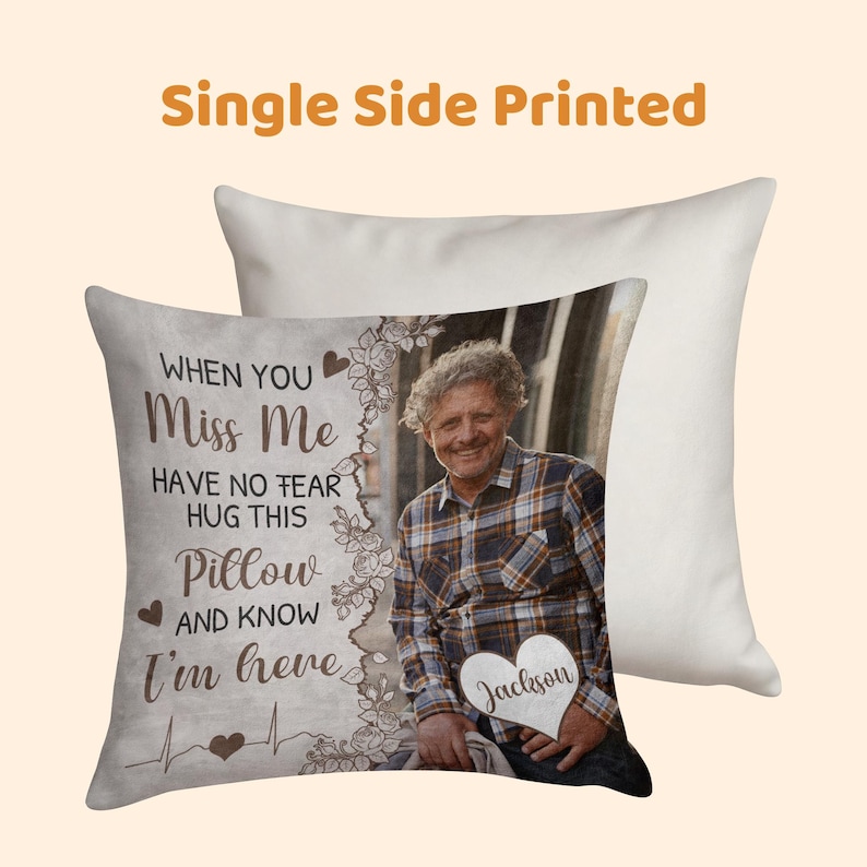 May include: A decorative pillow with a printed image of a person and the text "When You Miss Me, Have No Fear, Hug This Pillow And Know I'm Here." The pillow also features a heart-shaped element with the name "Jackson".