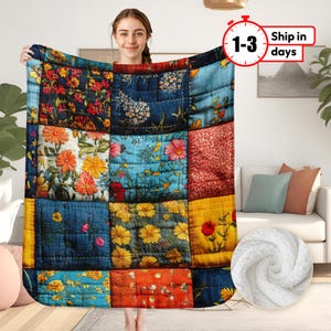 May include: A patchwork quilt throw blanket with a variety of floral patterns in shades of blue, red, yellow, and green. The quilt is made of different fabrics and textures, creating a unique and interesting design.