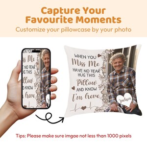 May include: A personalized pillow with a photo and text. The pillow features a picture of a person and the words "When you miss me, have no fear, hug this pillow and know I'm here." A phone displays the same image. The text "Capture Your Favourite Moments" is at the top.