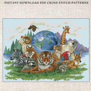 May include: A cross stitch pattern featuring a colorful illustration of a globe surrounded by various animals, including a tiger, zebra, giraffe, deer, and a raccoon. The animals are all looking at the globe, which is surrounded by clouds and mountains.