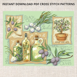 May include: Cross stitch pattern featuring a still life of olive oil bottles, olives, garlic, and a potted olive tree. The text "Olea Epaca", "BLACK OLIVES", "Garlic", "HUILE D'OLIVES", "Mediterranean Olives", and "SPANISH OLIVES" is included in the image.