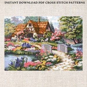 May include: A cross stitch pattern depicting a quaint cottage with a thatched roof, nestled in a vibrant garden. The cottage has a white exterior with brown trim and windows. The garden is filled with a variety of colourful flowers, including pink, purple, yellow, and white, and features a pond and a stone path leading to a white bridge.