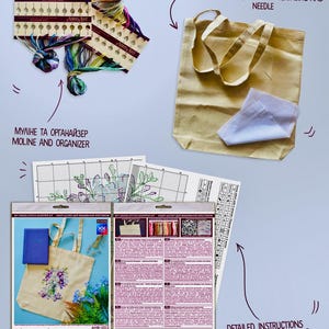 May include: A cross-stitch kit with a shopper bag, fusible interfacing, and needle. The kit includes a moline and organizer, detailed instructions, and a design featuring floral artwork. The kit is labeled "Spring Tenderness."