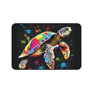May include: A colorful sea turtle with a black background and colorful paint splatters. The turtle is swimming with its head up and its flippers outstretched.