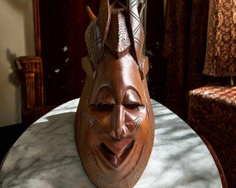 Vintage African Wood Mask, Hand Carved Tribal Wall Decor, Horned Boho Wall Hanging, Folk Art Statement Piece, 62x25 cm