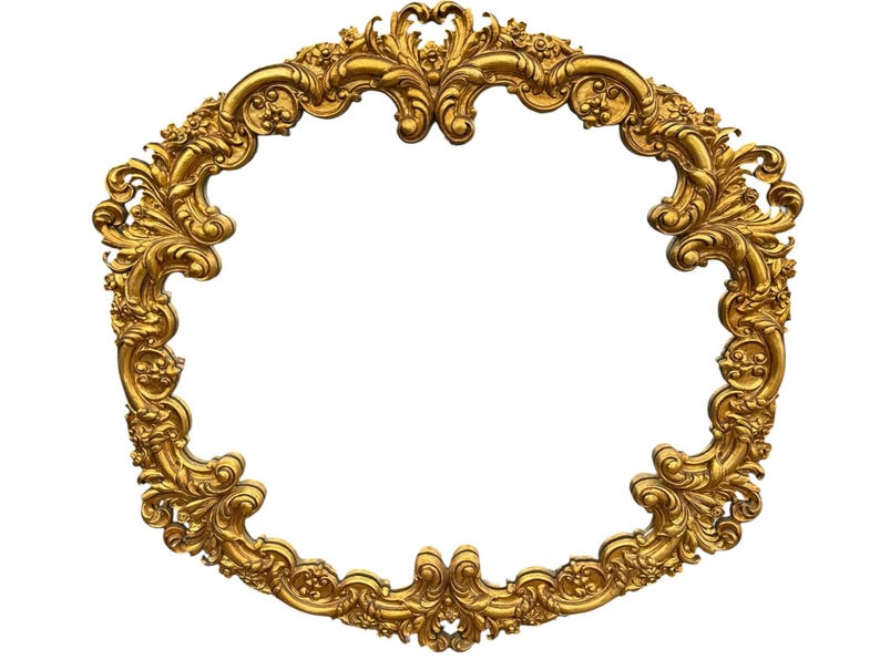 May include: Ornate, oval-shaped gold frame with intricate floral and scrollwork detailing. The frame has a rich, metallic finish and a classic, vintage aesthetic. The design is symmetrical and features a blank center.