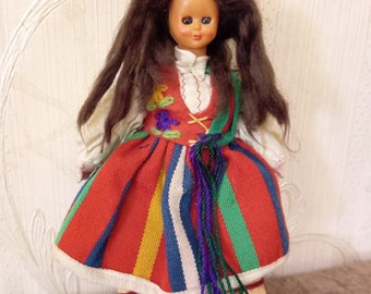Old doll. Doll in national costume. Height 21 centimeters.