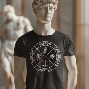 May include: A black t-shirt featuring a white circular design with the words "Courage", "Wisdom", "Temperance", and "Justice". The design includes a lion, an owl, a lotus flower, and scales. The shirt is displayed on a statue.