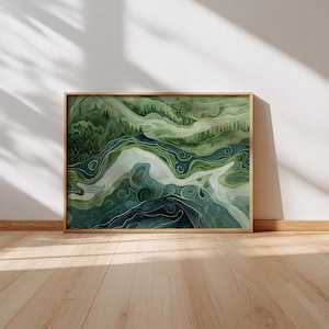 Puede incluir: Una pintura de paisaje en acuarela enmarcada con temática natural. La obra presenta tonos verdes y azules, que representan colinas, árboles y un río. La pintura está encerrada en un marco de madera marrón claro.