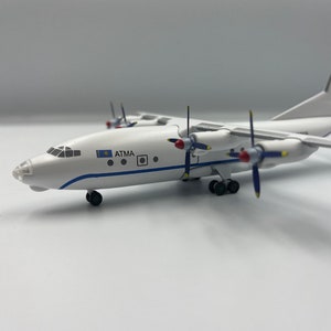 Модель самолета Ан-12АТМА Reg UN-11018 масштаб 1:200
