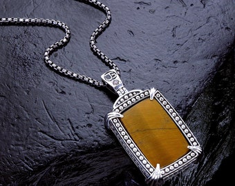 Colgante grueso con marco de plata de ley con ojo de tigre amarillo y diamante de talla brillante. Raro y único. Ideal.