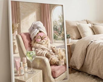 May include: A framed print depicts a cat in a spa setting. The cat wears a towel on its head and a robe, with a face mask. A glass of water with cucumber slices, skincare products, and perfume are on a side table. The cat is seated in a pink chair.