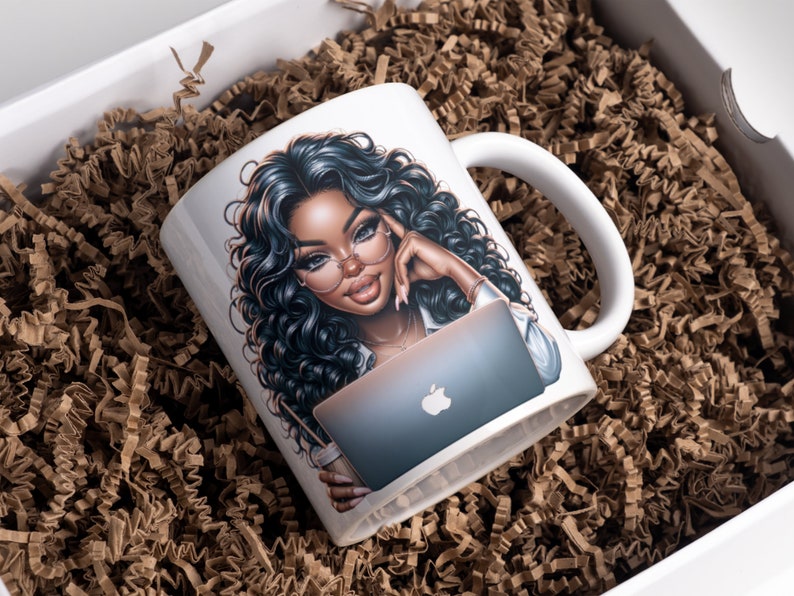 May include: White ceramic mug with a colorful illustration of a woman with long black hair wearing glasses and using a laptop. The woman is holding a cup of coffee in her other hand.