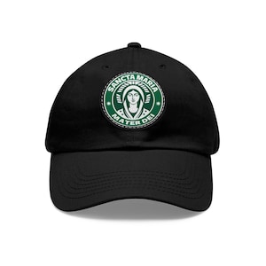 May include: Black baseball cap with a green and white patch that says "Sancta Maria Mater Dei" with a stylized image of the Virgin Mary inside.