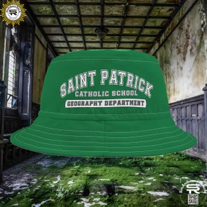 May include: Green bucket hat with the text "Saint Patrick Catholic School Geography Department" in white.