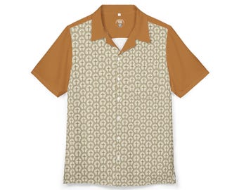 Op de afbeelding: Kort mouwen overhemd in bruin en beige. De voorkant heeft een herhalend kruispatroon, terwijl de mouwen en kraag effen bruin zijn. Het overhemd heeft een kampkraag en een knoopsluiting.