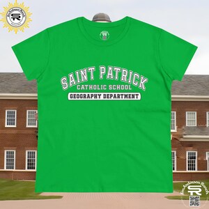 May include: Green t-shirt with white text that reads "Saint Patrick Catholic School Geography Department".