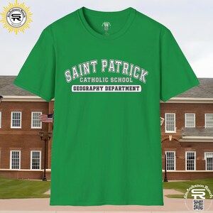 May include: Green t-shirt with white text that reads "Saint Patrick Catholic School Geography Department".