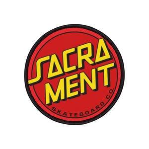 May include: A red and yellow round patch with the text "Sacramento Skateboard Co."
