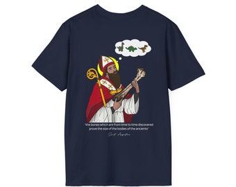 May include: A navy blue t-shirt with a cartoon illustration of a man holding a large bone. The man is wearing a red and gold robe and a mitre. A thought bubble above his head shows three cartoon dinosaurs. The text "the bones which are from time to time discovered prove the size of the bodies of the ancients" is printed below the illustration.