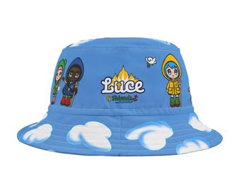 May include: Blue bucket hat with a white cloud pattern. The hat features a cartoon illustration of two children and the text "Luce & Friends."