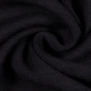 May include: Black fabric with a textured weave. The fabric is folded and draped, showing the texture and drape of the material.