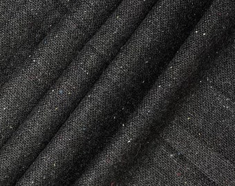 Könnte beinhalten: Nahaufnahme eines schwarzen Stoffes mit einer dezenten, gesprenkelten Textur. Der Stoff hat eine leicht raue, gewebte Optik.