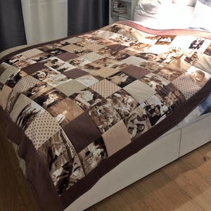 May include: A sepia-toned patchwork quilt with a brown border, displayed on a bed. The quilt is made up of squares, each featuring a different photograph. The design creates a personalized and nostalgic aesthetic.