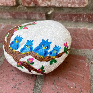 Birds painted on rock