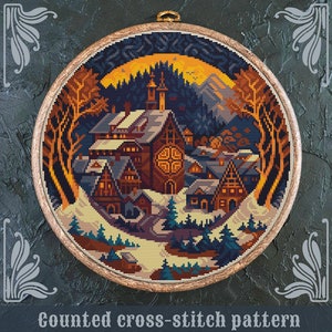May include: Counted cross-stitch pattern of a winter village scene with a large church building in the center. The village is surrounded by trees and snow. The sky is a dark blue with a bright yellow moon. The pattern is framed in a wooden hoop. "Counted cross-stitch pattern by StitchingLand ©" is written below the image.