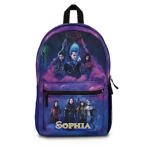 May include: A purple backpack featuring characters from a movie, with the name "SOPHIA" in gold lettering. The backpack has a black handle and zipper, and a front pocket. The design includes images of several people against a backdrop of purple clouds.