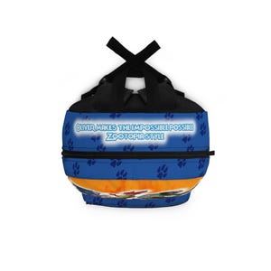 May include: A blue backpack with the text "OLIVER MAKES THE IMPOSSIBLE POSSIBLE ZOOTOPIA STYLE." The backpack has a paw print pattern and an orange stripe. Black straps and a black top complete the design.
