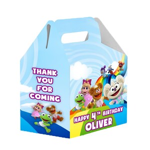May include: A blue and white favor box with a rainbow and Sesame Street characters. The box says "Thank you for coming" and "Happy 4th Birthday Oliver".