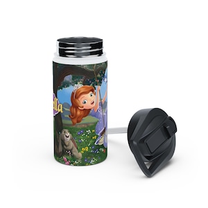 May include: A white water bottle with a cartoon illustration of a princess on a swing. The bottle has a black lid and a white straw. The princess wears a purple dress and a crown. The word "Sofia" is printed on the bottle.
