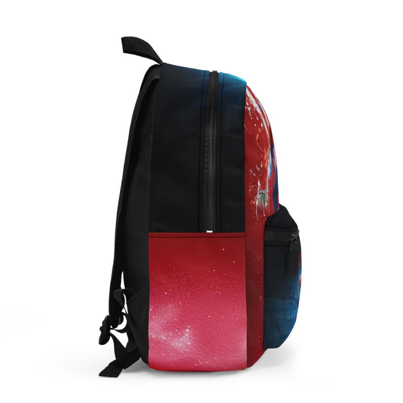 May include: Black backpack with a red and blue graphic design. The backpack features a large main compartment, a front pocket, and adjustable shoulder straps. The design has a gradient effect with white speckles.